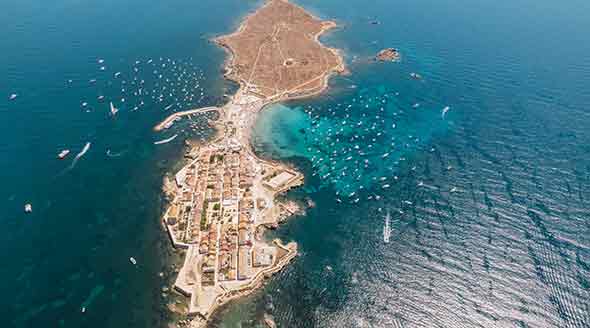 Aerial view of Tabarca island with boats at anchor